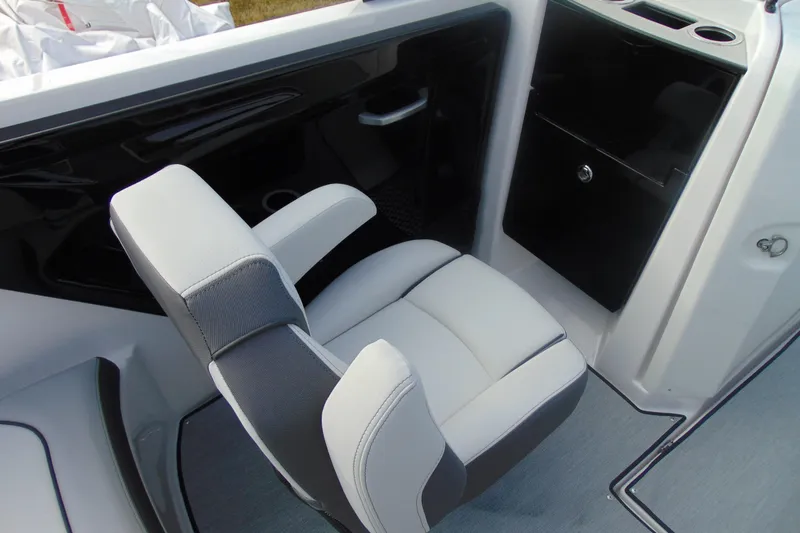 Slide: The Image of 2026 Yamaha Boats AR250 interior with sleek seating and modern design. - 13