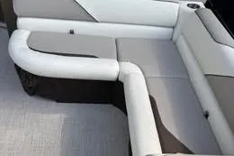Slide: The Image of 2026 Avalon VENTURE 85 CRUISE boat seating, featuring modern white and gray upholstery. - 5