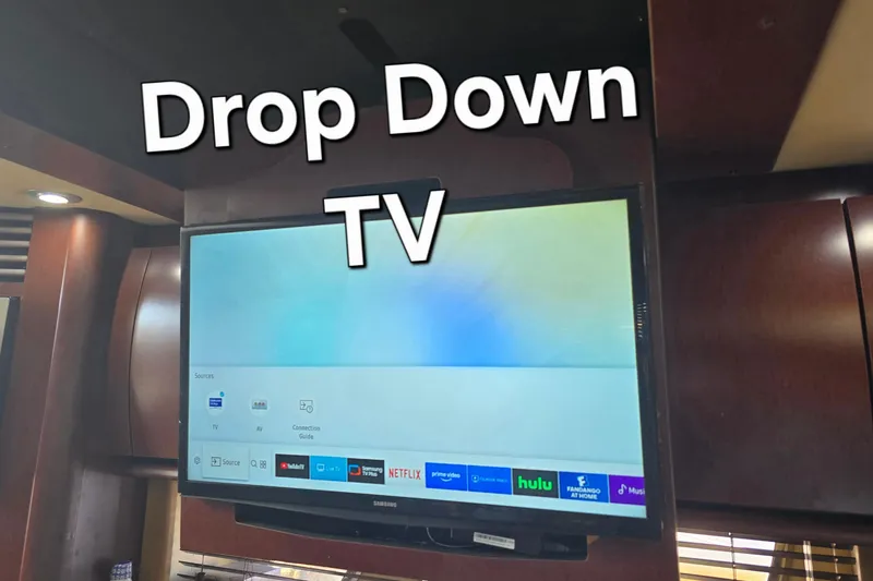 Slide: The Image of Drop-down TV in 2007 Sea Ray 40 Sundancer yacht interior. - 14