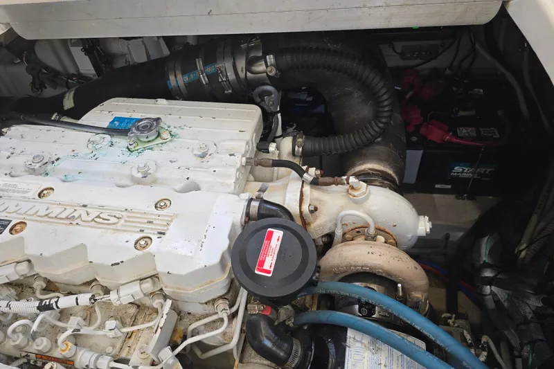 Slide: The Image of Engine compartment of a 2007 Sea Ray 40 Sundancer with Cummins engine components. - 31