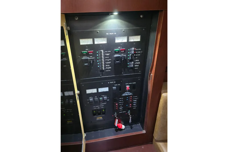 Slide: The Image of Electrical control panel on a 2007 Sea Ray 40 Sundancer yacht. - 33