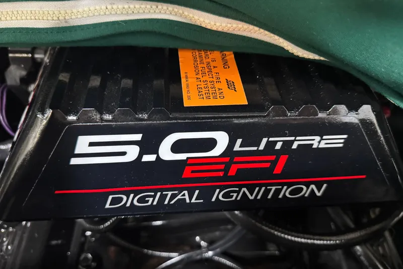 Slide: The Image of 5.0 Litre EFI engine cover of 1998 Crownline 202 BR boat. - 19