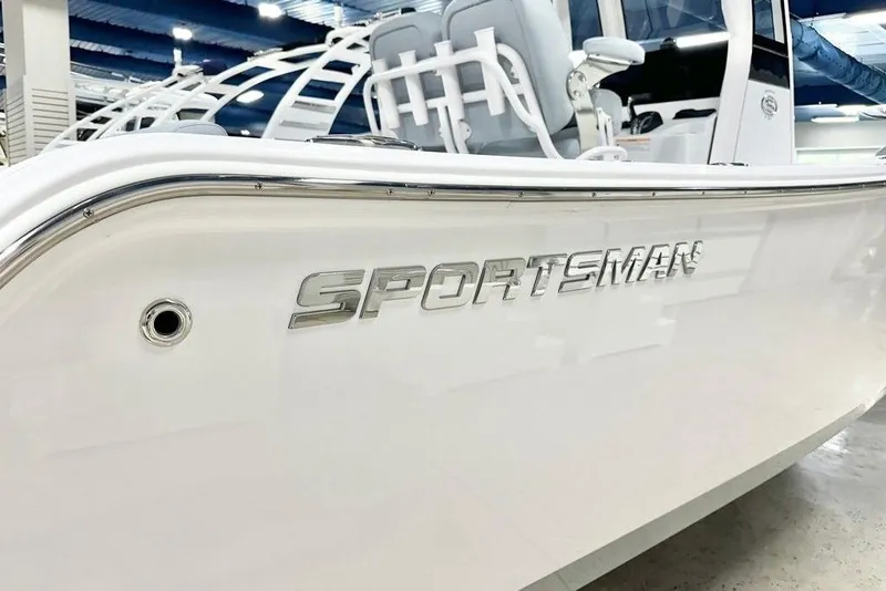 Slide: The Image of 2026 Sportsman Open 232 Center Console boat with sleek design and modern features. - 11