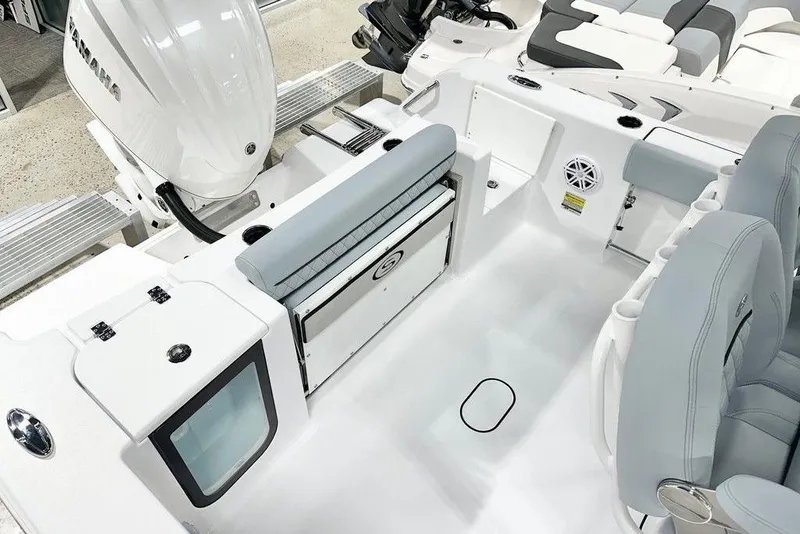 Slide: The Image of 2026 Sportsman Open 232 Center Console boat interior with seating and storage features. - 8