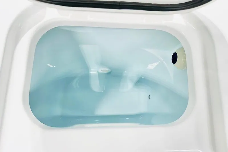 Slide: The Image of Livewell of 2026 Sportsman Open 232 Center Console boat, filled with water. - 9