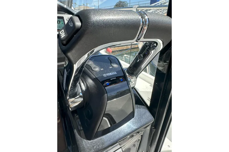 Slide: The Image of Close-up of Yamaha throttle control on 2021 Jeanneau NC895 boat. - 15