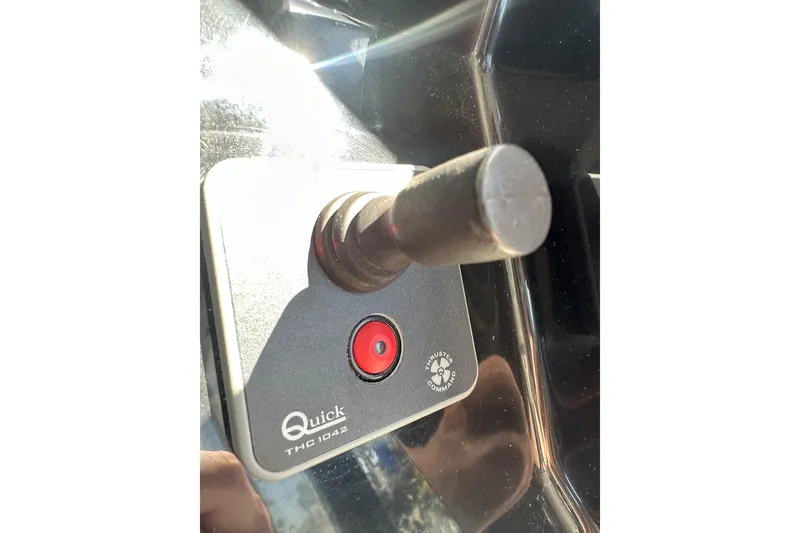 Slide: The Image of Joystick control panel on a 2021 Jeanneau NC895 boat, featuring Quick THC 1042. - 17