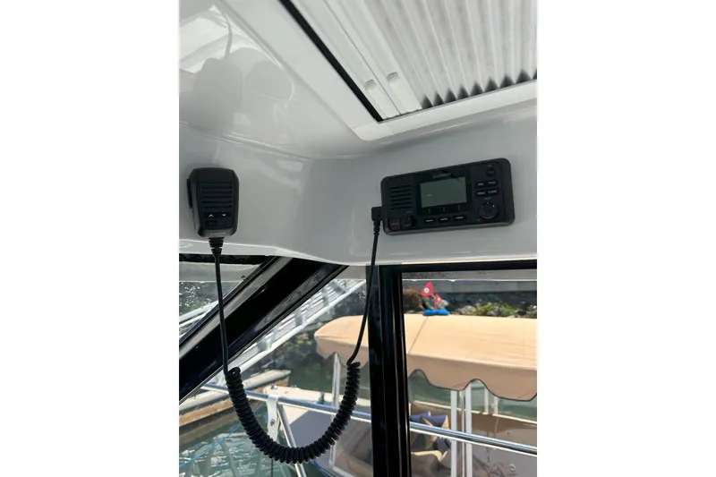 Slide: The Image of Interior view of 2021 Jeanneau NC895 boat with Garmin marine radio system. - 22