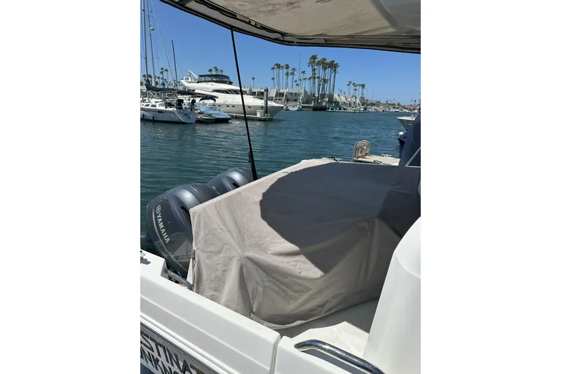 Slide: The Image of 2021 Jeanneau NC895 boat with Yamaha engines docked in a marina. - 42