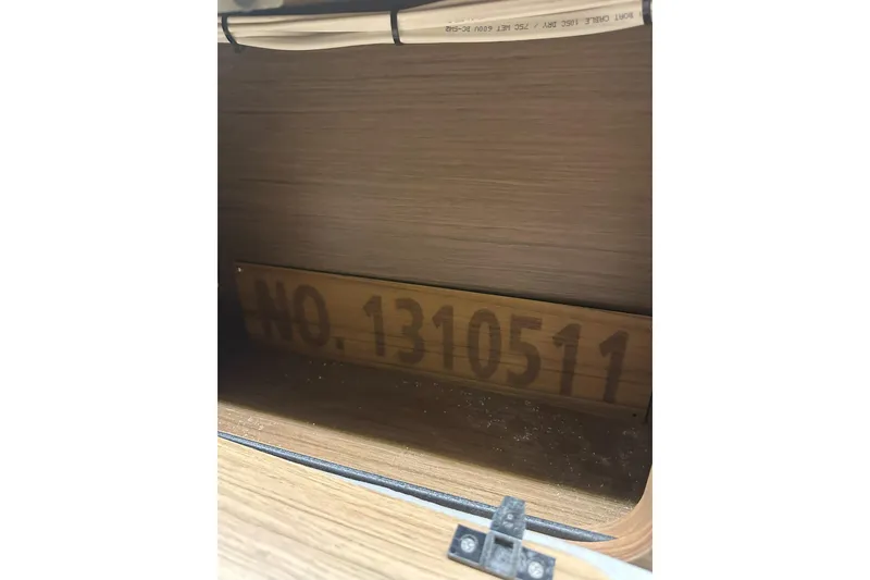 Slide: The Image of Interior of 2021 Jeanneau NC895 boat showing compartment with number 1310511. - 44