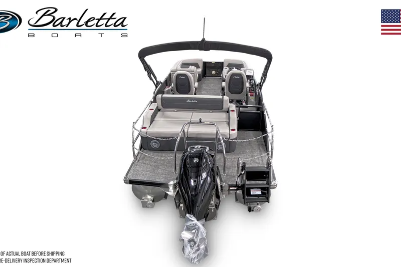Slide: The Image of 2026 Barletta Cabrio 22UC pontoon boat on trailer, parked outdoors. - 2