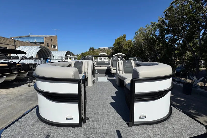Slide: The Image of 2026 Barletta Cabrio 22UC pontoon boat with spacious seating and modern design. - 32