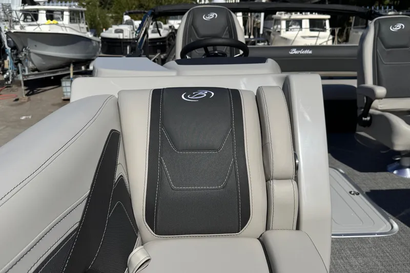 Slide: The Image of 2026 Barletta Cabrio 22UC boat interior with luxurious seating and sleek design. - 40