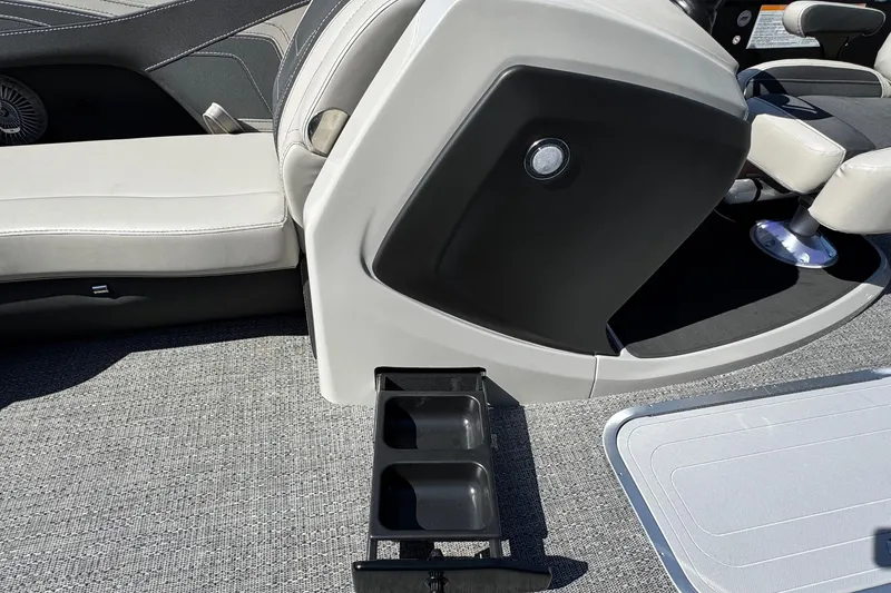 Slide: The Image of 2026 Barletta Cabrio 22UC boat interior with cup holders and seating. - 42