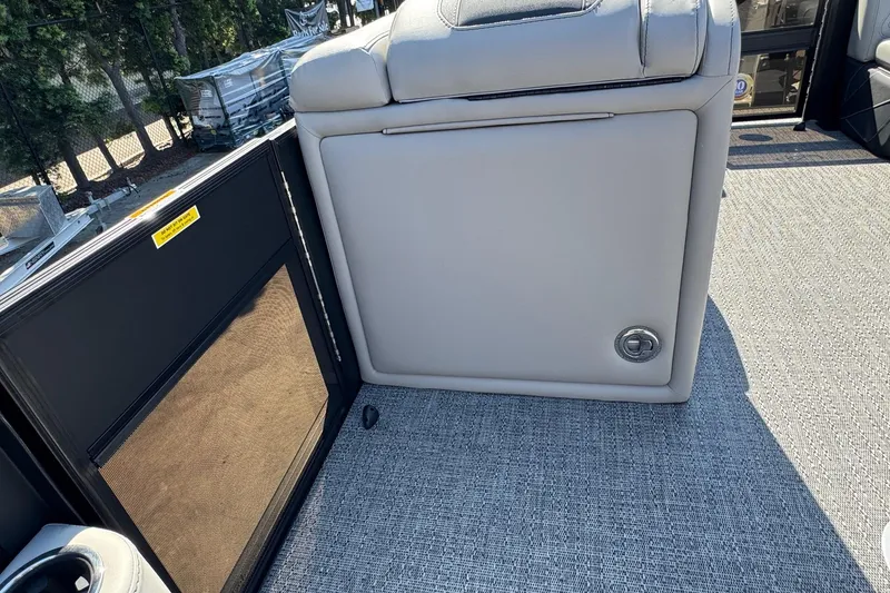 Slide: The Image of 2026 Barletta Cabrio 22UC boat interior with gray upholstery and carpeted flooring. - 47