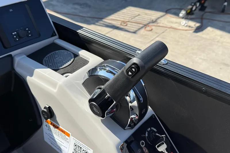 Slide: The Image of Throttle control and dashboard of 2026 Barletta Cabrio 22UC boat. - 59