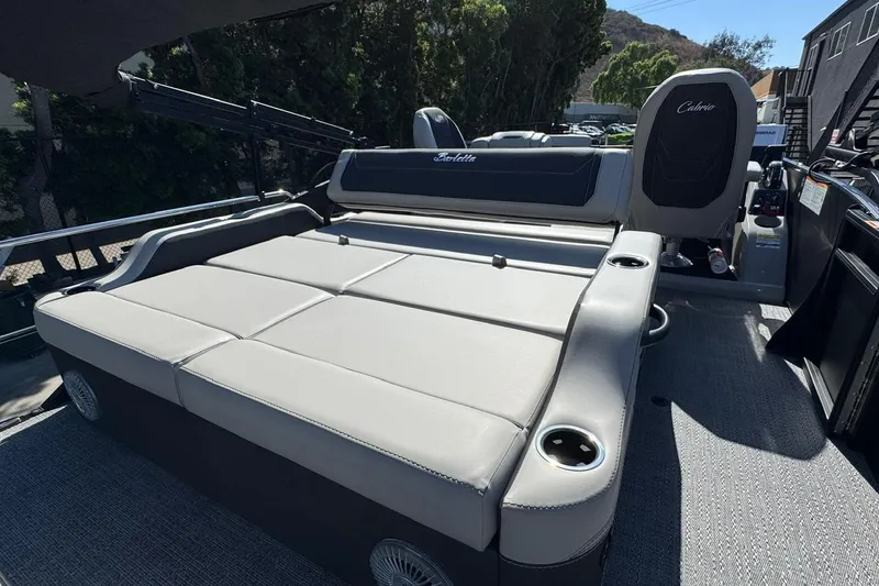 Slide: The Image of 2026 Barletta Cabrio 22UC pontoon boat with spacious seating and modern design. - 64
