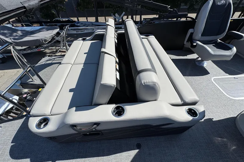 Slide: The Image of 2026 Barletta Cabrio 22UC boat interior with gray seating and cup holders. - 69