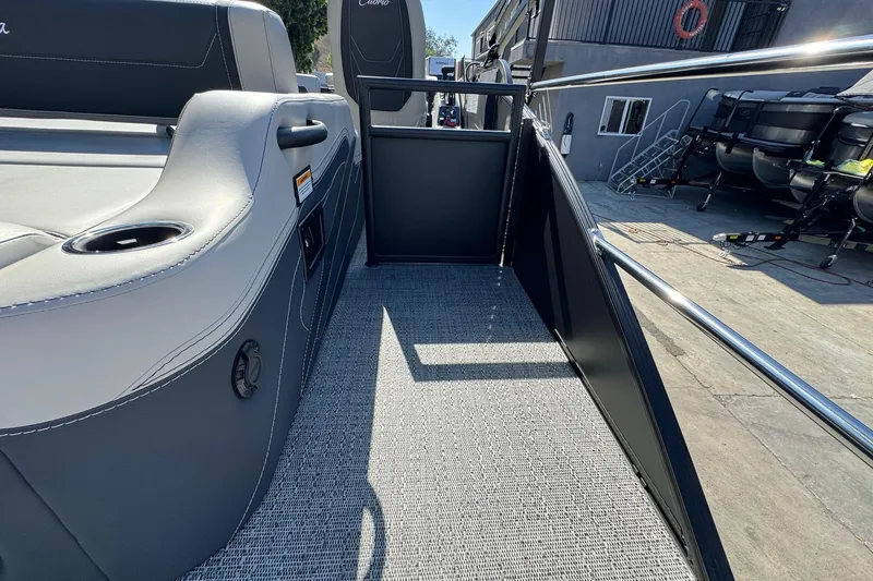 Slide: The Image of 2026 Barletta Cabrio 22UC pontoon boat interior with sleek seating and modern design. - 70