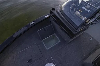 Slide: The Image of Manufacturer Provided Image: 2026 Crestliner 1850 Fish Hawk boat interior with storage compartments and Lowrance electronics. - 22