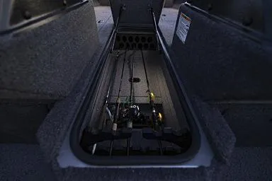 Slide: The Image of Manufacturer Provided Image: 2026 Crestliner 1850 Fish Hawk rod storage compartment with fishing rods. - 27
