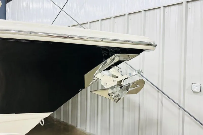 Slide: The Image of 2026 Scout 260 LXF boat anchor detail in a storage facility. - 18