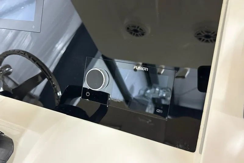 Slide: The Image of Control panel of 2026 Scout 260 LXF boat with Fusion audio system. - 6