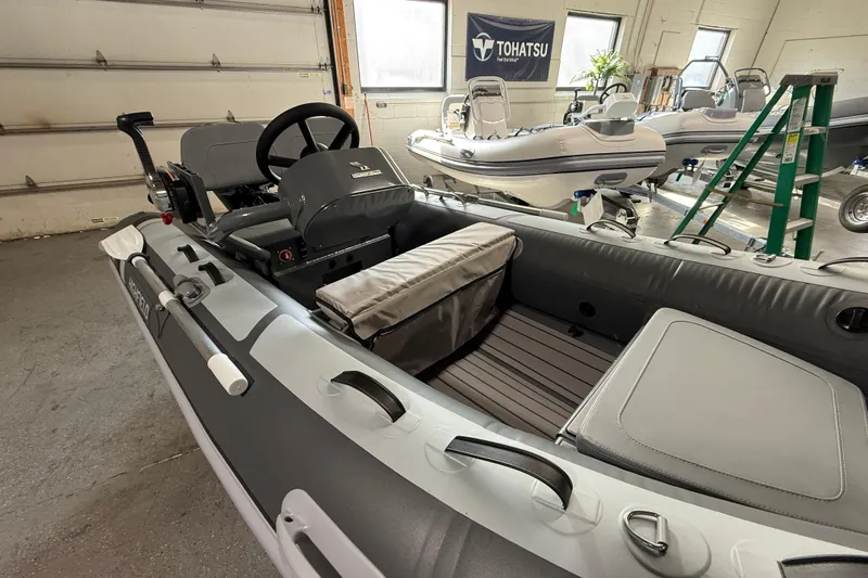 Slide: The Image of 2026 Highfield Classic 360 FCT inflatable boat in a showroom, featuring a sleek interior design. - 15