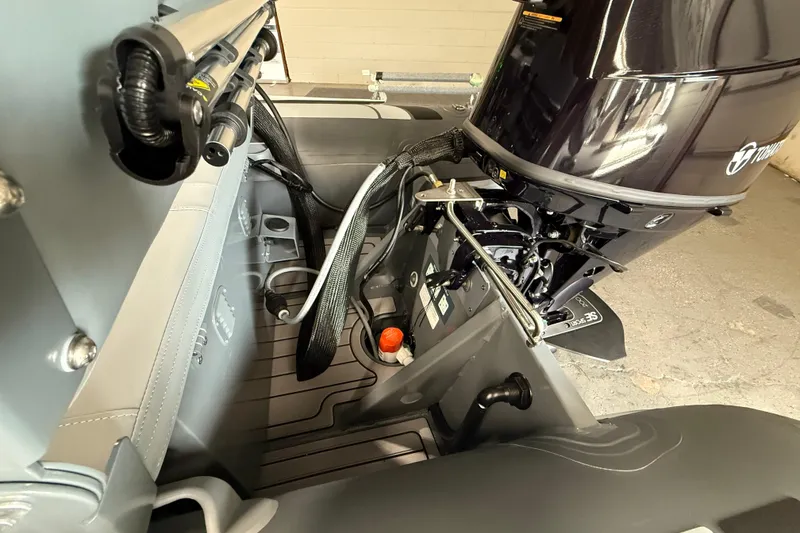 Slide: The Image of Highfield Classic 360 FCT 2026 boat interior with motor and seating details. - 19