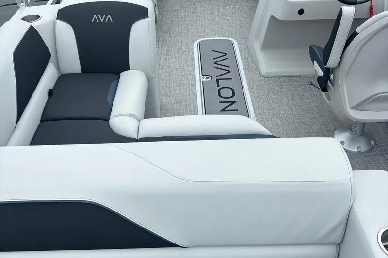 Slide: The Image of 2025 Avalon Venture Cruise Rear Bench with sleek white and gray seating design. - 11