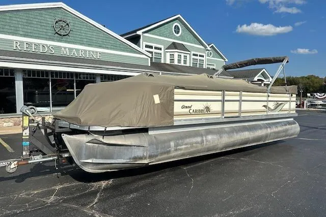 Slide: The Image of 2001 Crest Grand Caribbean pontoon boat with cover at Reed's Marine. - 27