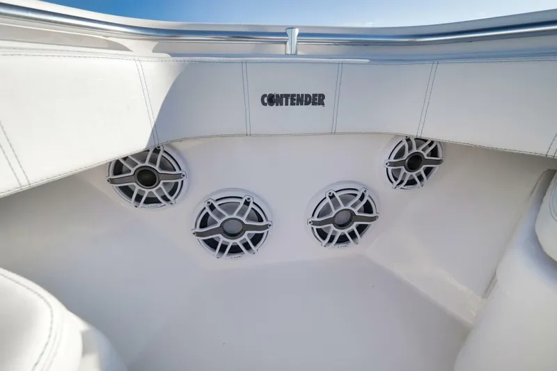 Slide: The Image of 2023 Contender 39 ST boat interior with speakers and branded upholstery. - 22