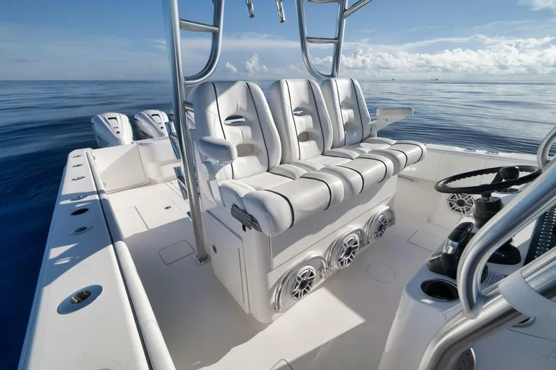 Slide: The Image of 2023 Contender 39 ST boat interior with luxurious seating and ocean view. - 37