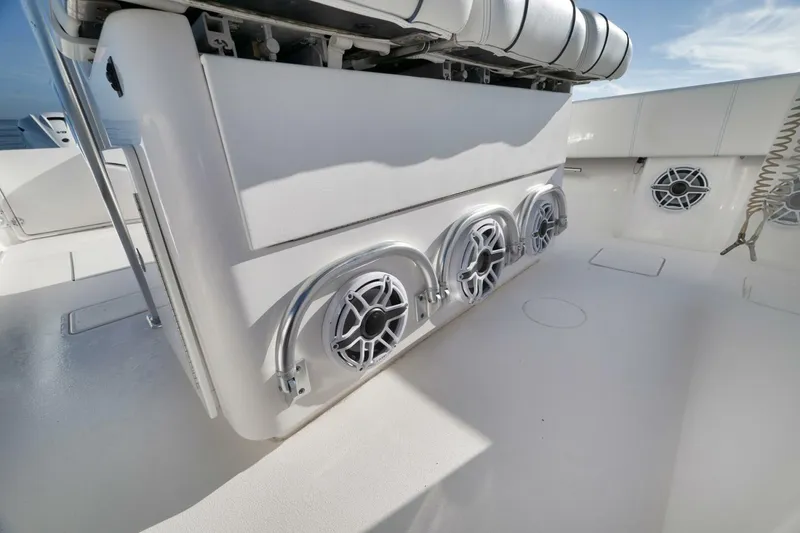 Slide: The Image of 2023 Contender 39 ST boat interior with sleek design and modern speaker system. - 38