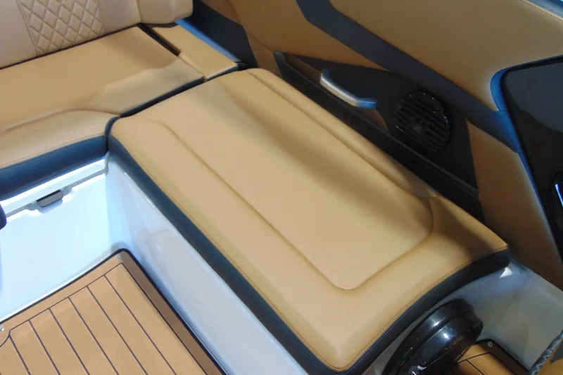 Slide: The Image of 2026 Yamaha Boats 252SD interior seating with tan upholstery and sleek design. - 13
