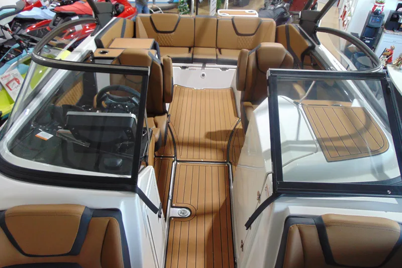 Slide: The Image of 2026 Yamaha Boats 252SD interior with tan seating and sleek design. - 22