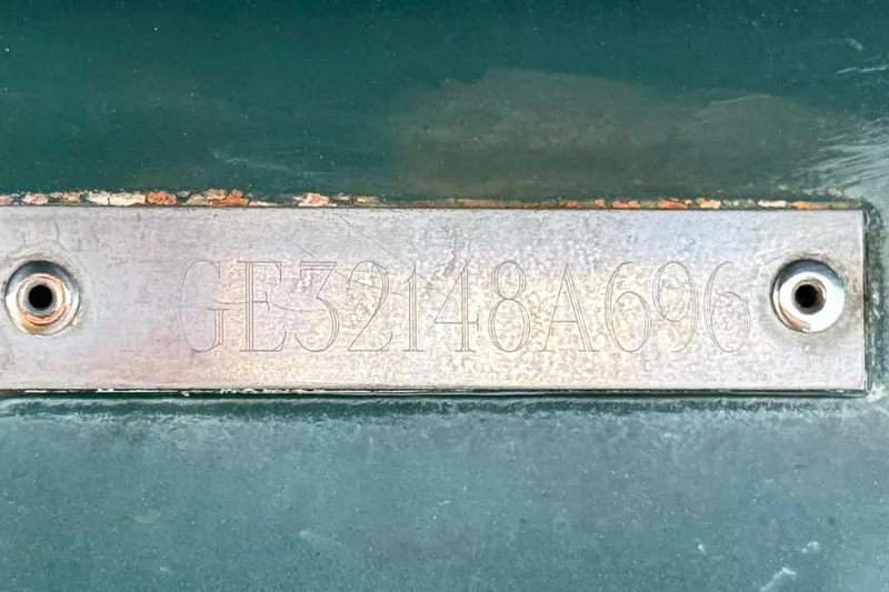 Slide: The Image of Metallic identification plate on a 1996 Cobalt 232 boat, displaying serial number GE32148A696. - 25