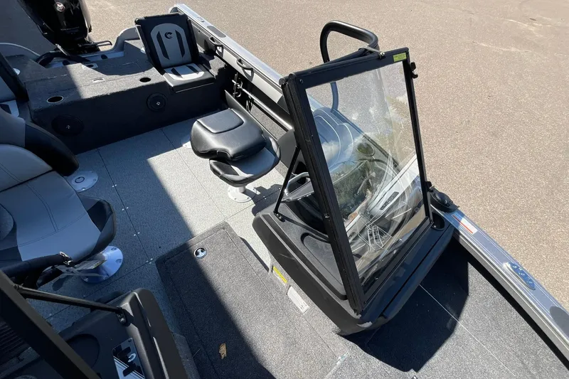 Slide: The Image of 2026 Crestliner 1750 Super Hawk interior with seating and steering console. - 13