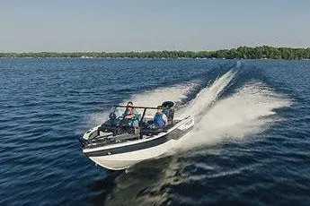 Slide: The Image of Manufacturer Provided Image: 2025 Crestliner 1750 Super Hawk speeding on a lake under clear skies. - 19