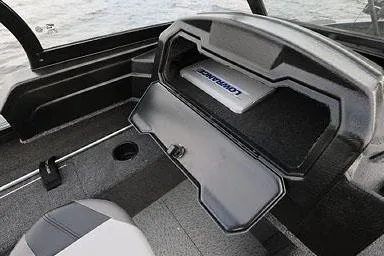 Slide: The Image of Manufacturer Provided Image: 2025 Crestliner 1750 Super Hawk dashboard with Lowrance equipment, open storage compartment. - 22