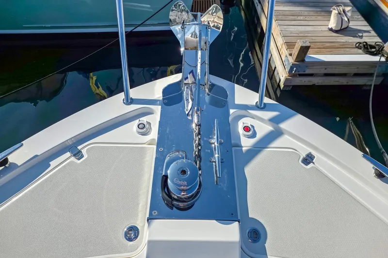 Slide: The Image of Bow of 2026 Back Cove 412 yacht with anchor and deck details. - 11