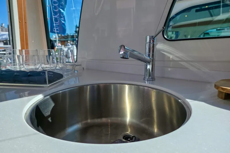 Slide: The Image of Stainless steel sink and faucet on 2026 Back Cove 412 yacht interior. - 26