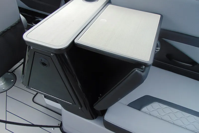 Slide: The Image of 2026 Yamaha Boats 255XD interior with sleek seating and modern design. - 13