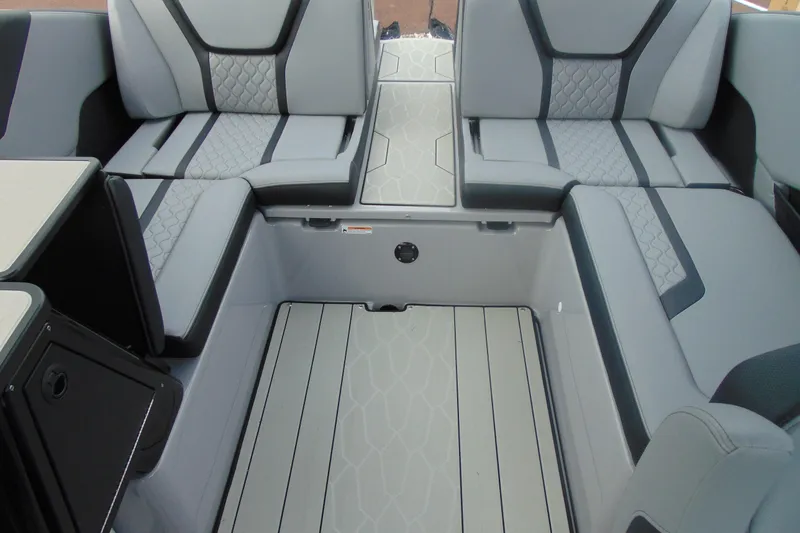 Slide: The Image of 2026 Yamaha Boats 255XD interior with modern seating and sleek design. - 14