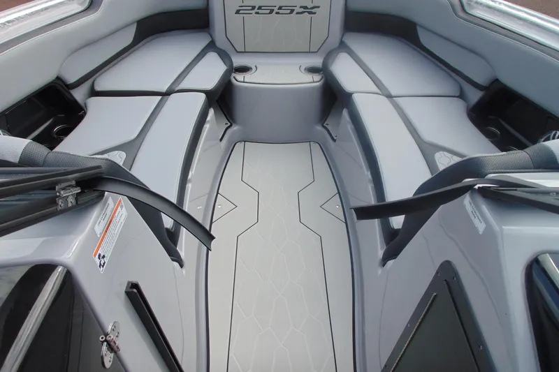 Slide: The Image of 2026 Yamaha Boats 255XD interior with sleek seating and modern design. - 21