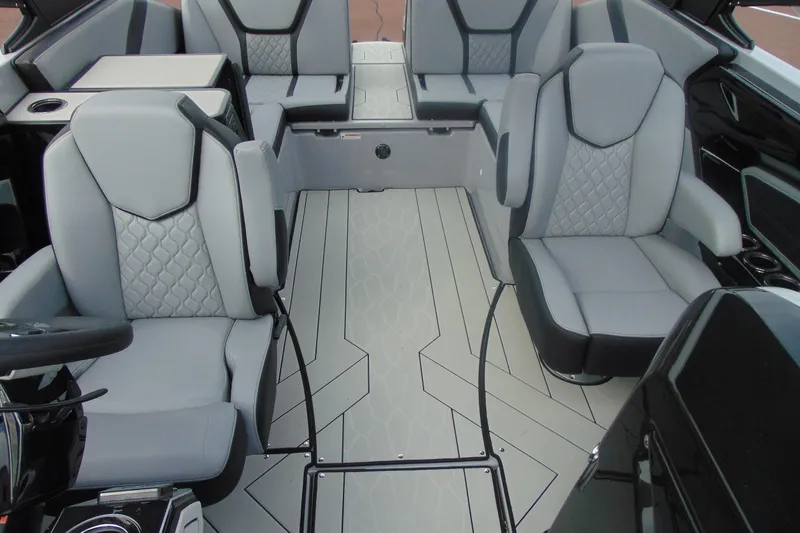 Slide: The Image of 2026 Yamaha Boats 255XD interior with modern seating and sleek design. - 25