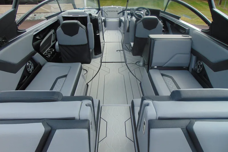 Slide: The Image of 2026 Yamaha Boats 255XD interior with sleek seating and modern design. - 9