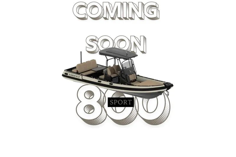 Slide: The Image of 2026 Highfield Sport 800 boat displayed indoors at a showroom. - 0