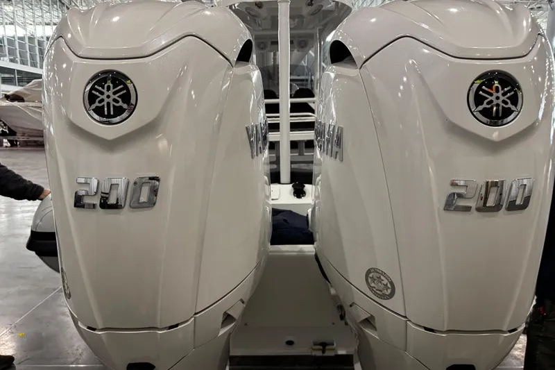 Slide: The Image of Twin Yamaha 200 outboard engines on a 2026 Highfield Sport 800 boat. - 7