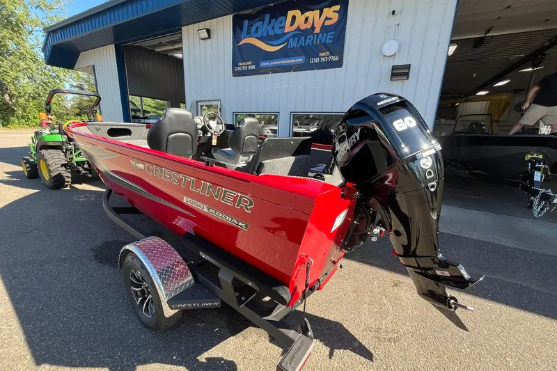Slide: The Image of 2026 Crestliner 1650 Kodiak boat with Mercury 60 engine at Lake Days Marine. - 1